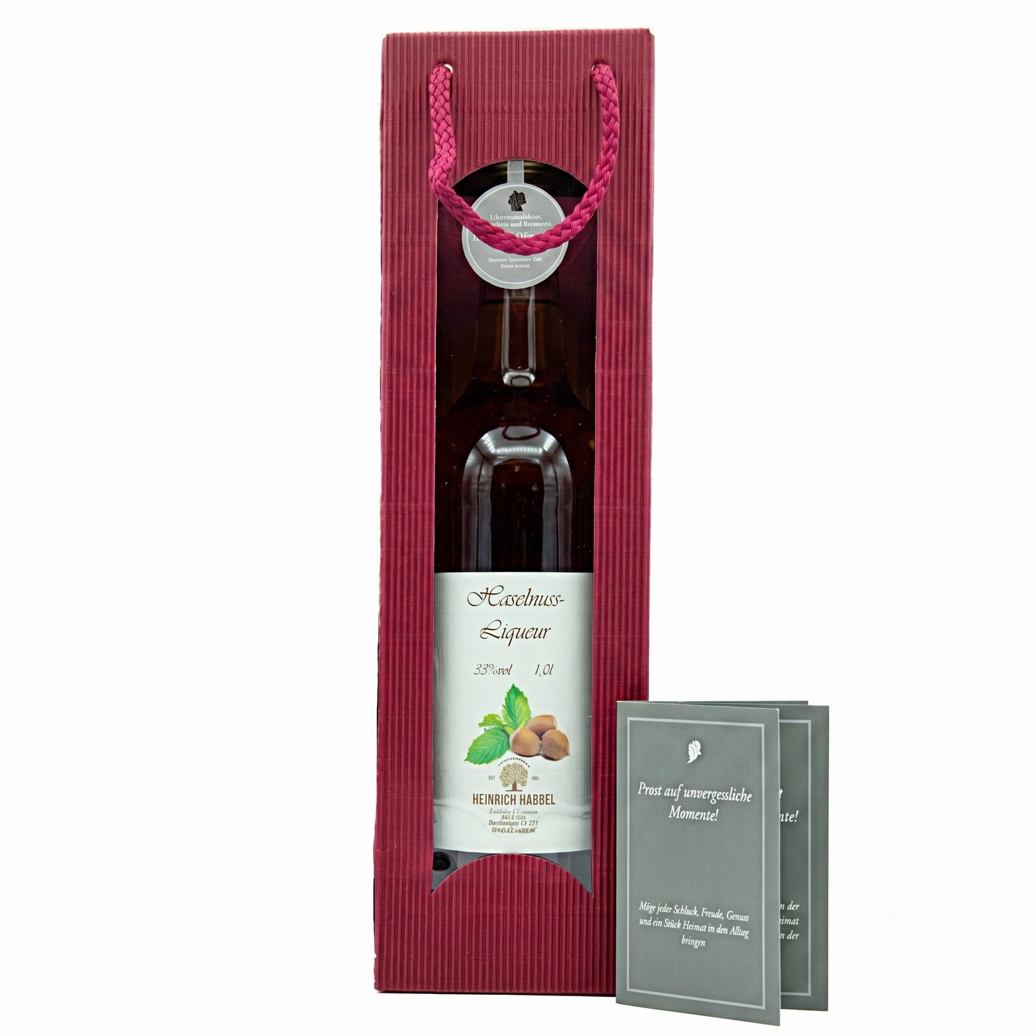 Haselnuss-Likör in eleganter Geschenkverpackung mit zwei Grußkarten, 33% vol, 1,0 l.