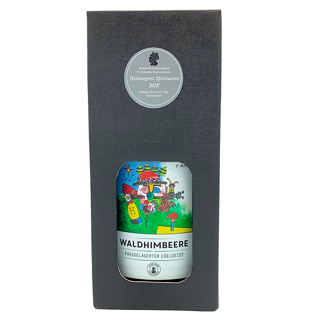 Waldhimbeere Edelgeist in eleganter Geschenkbox, farbenfrohes Design, hochwertige Spirituosen.