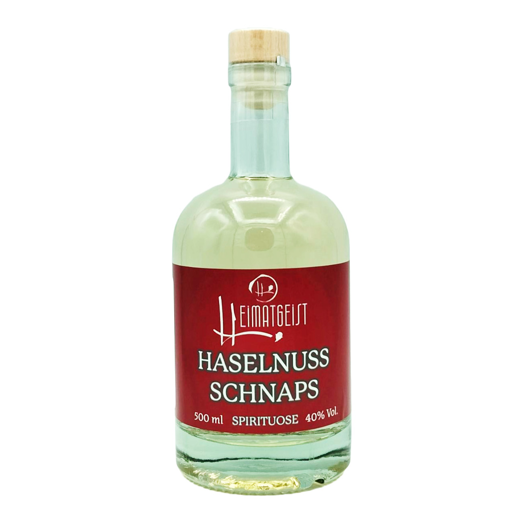 Haselnuss Schnaps in klarer Flasche, 500 ml, 40% Vol, rote Etikettierung, hochwertige Spirituose.